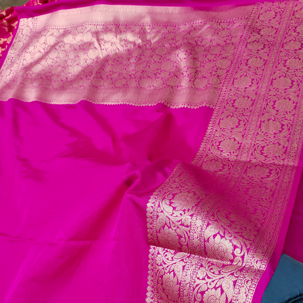 Hot Pink Warm Silk Banarasi Saree – All-over Plain Body With Skirt Border